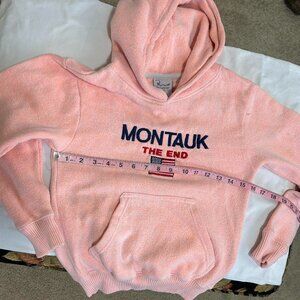 Soft Pink Montauk hoodie with dainty embroidered American flag peachy color